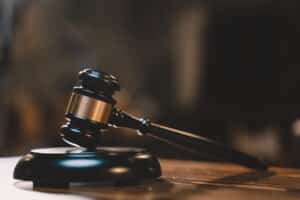 judgement of judge about legislation, authority, crime, government, justice, punishment, verdict at court decision by gavel. hammer is symbol of judgment and use law.