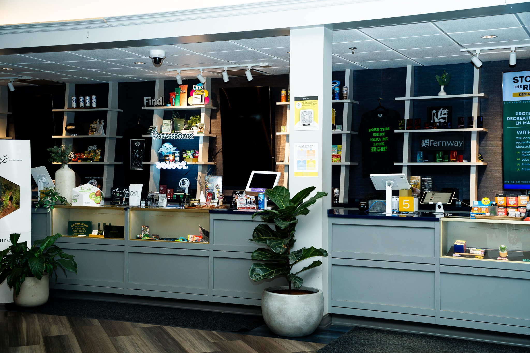 Pettals Cannabis Dispensary Attleboro - Check Out Counter with Cannabis Products and different branded retail displays